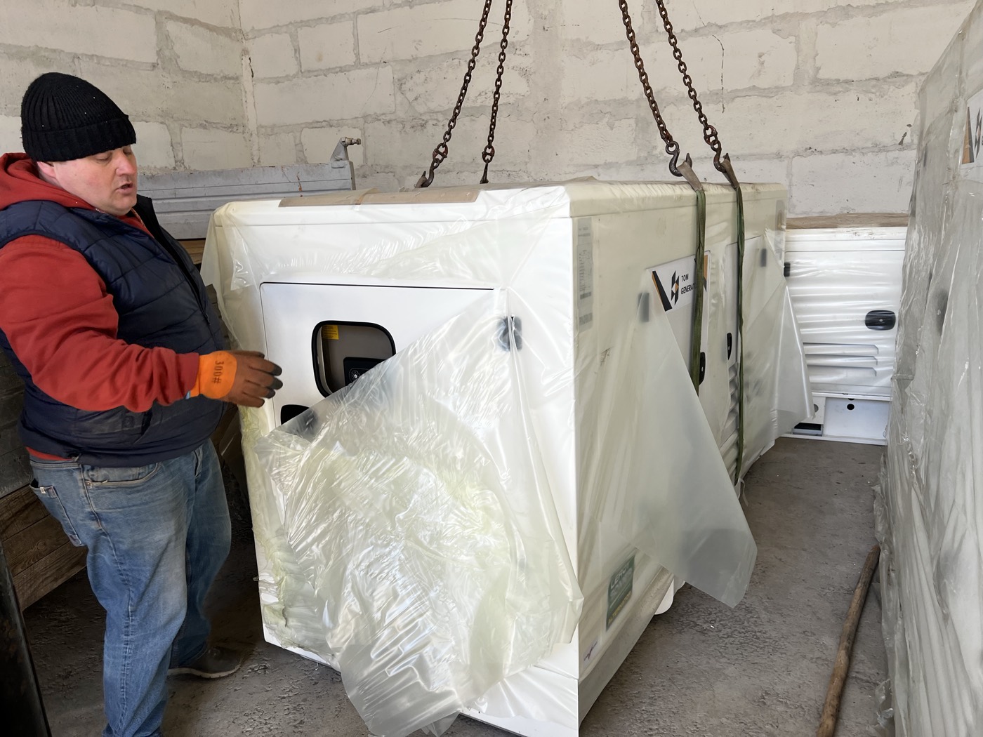 Our team handling a generator set into position